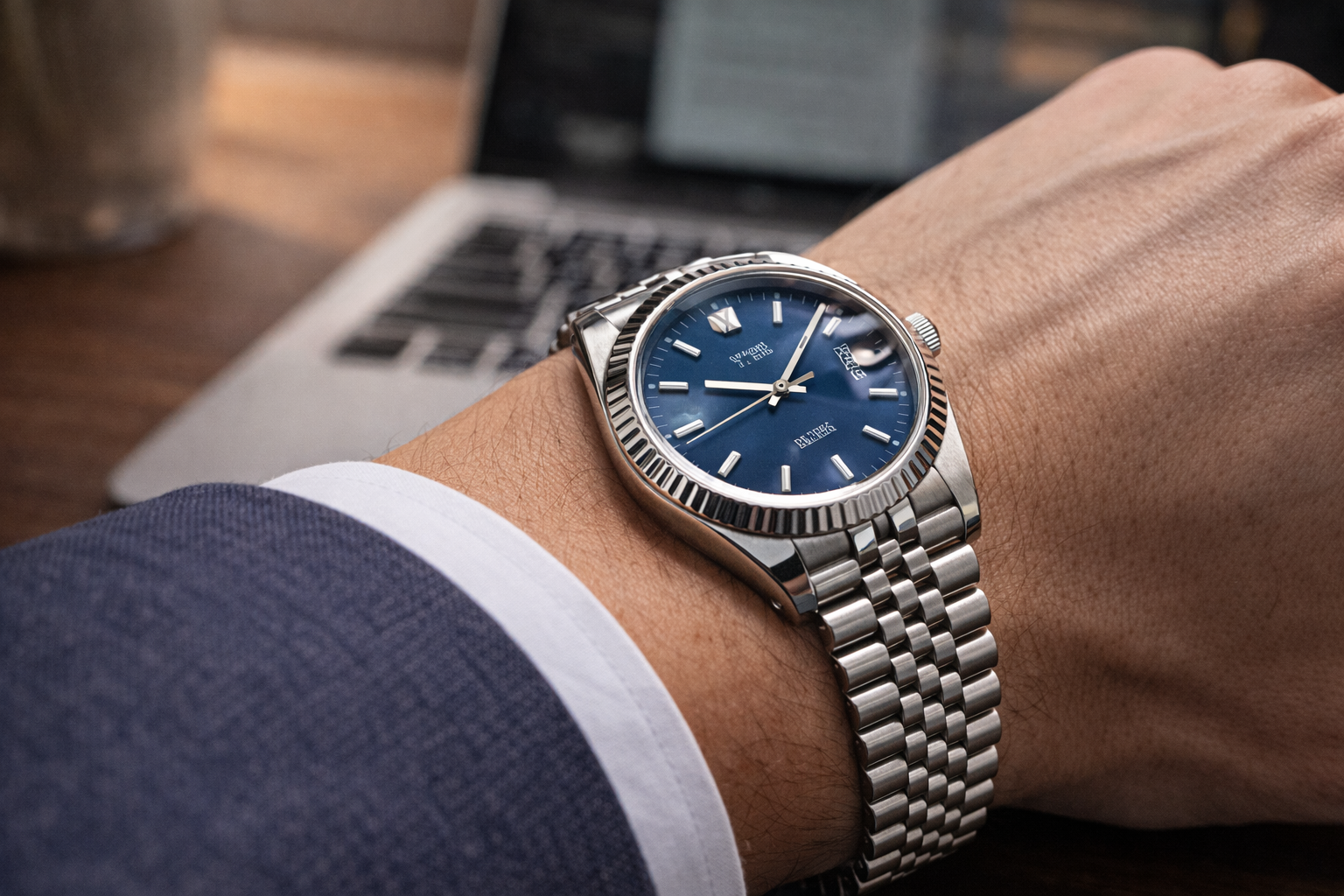 Datejust-style watch dial depth and crystal appearance under indoor office lighting